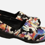 Colorful abstract pattern clog shoes with black sole, ideal for comfortable workwear fashion.